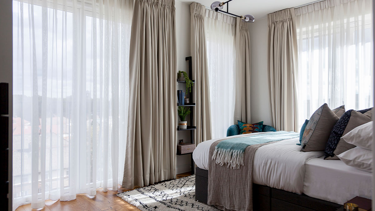 Chic bedroom with plenty of natural light and a stylish decor