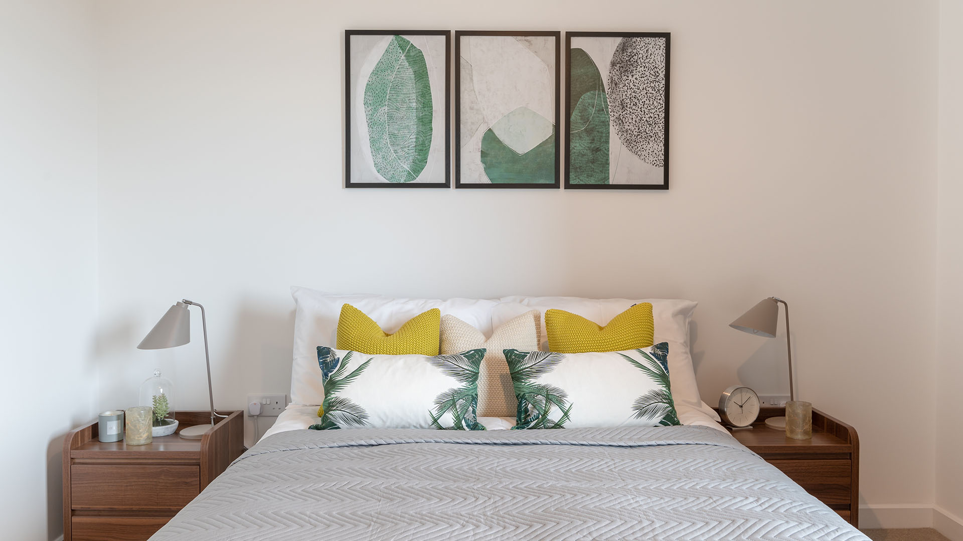 Modern bedroom with green and yellow accents