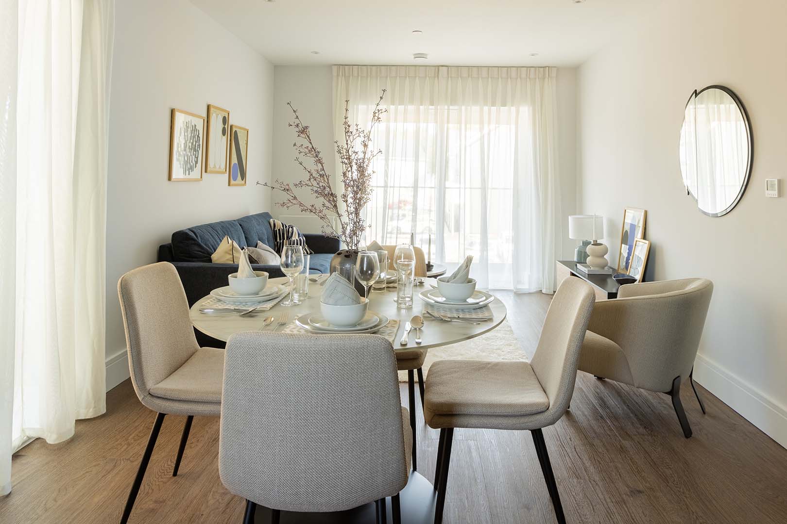 Open living dining room - table, sofa, neutral style