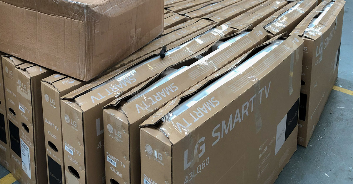 Close-up of LG Smart TV boxes in rows