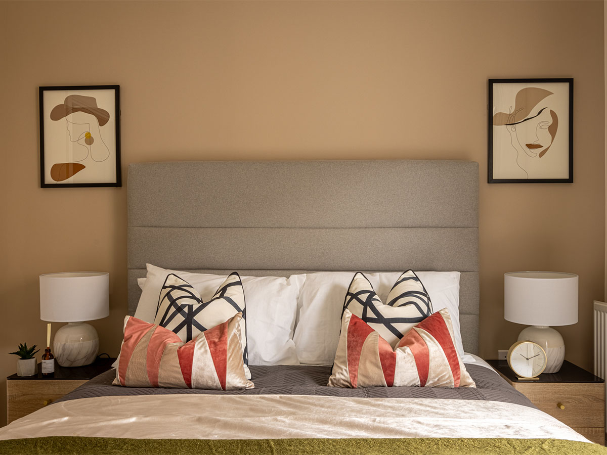 Decorative pillows with orange and beige tones