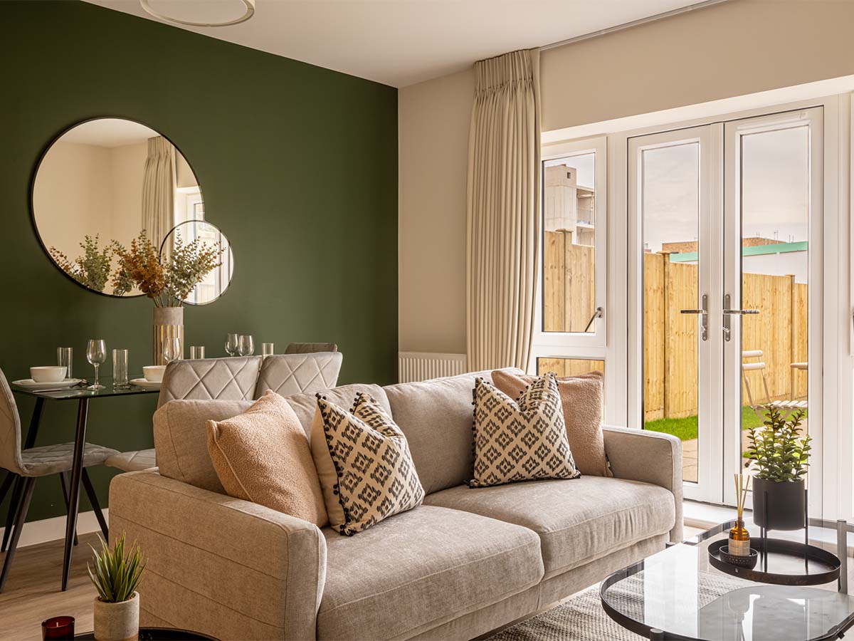 Open concept living with mirror and decor