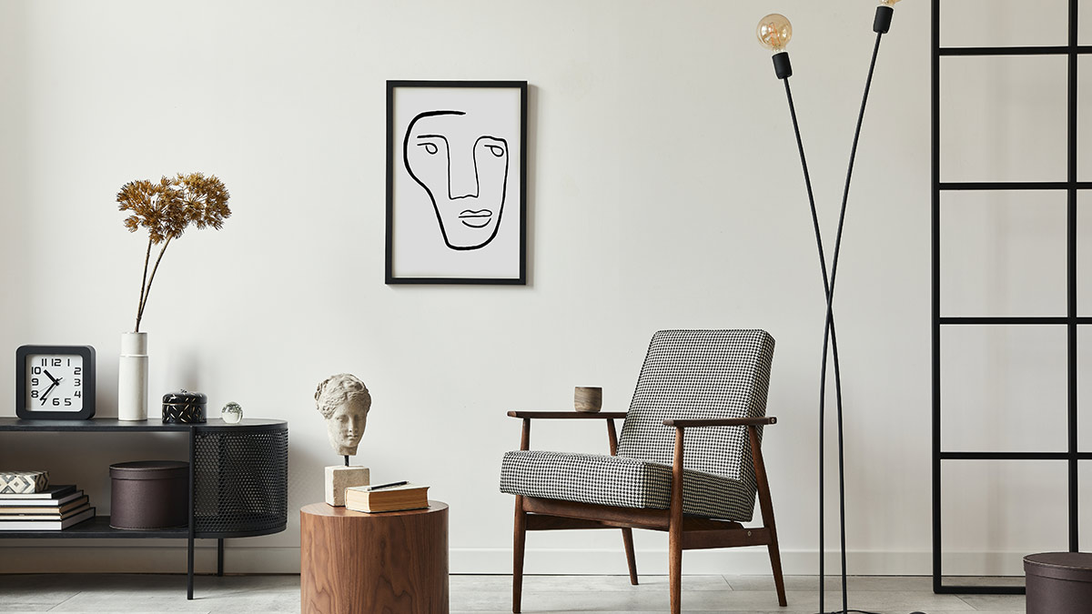 Patterned chair, tall lamp, art decor