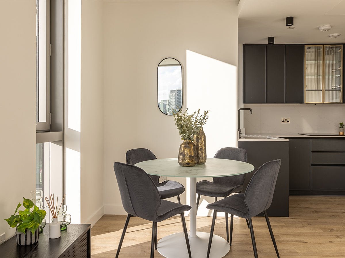 Dining area with modern table and vase decor
