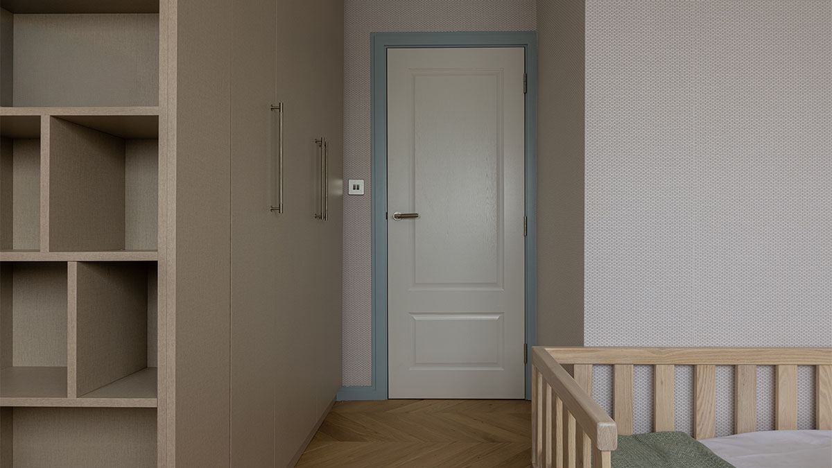 Room with fitted wardrobe and interior door