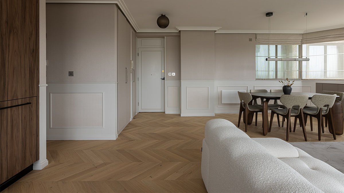 Open living space with dining table and sofa