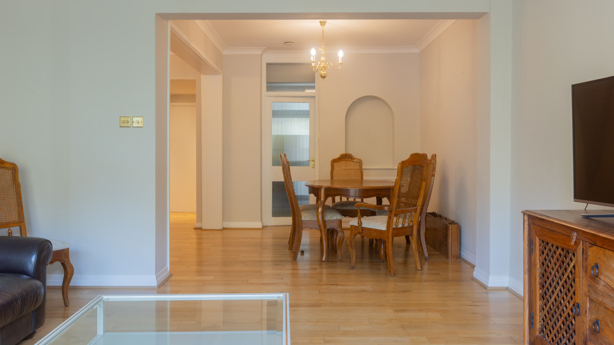 Living Room with Dining Area and Wood Flooring