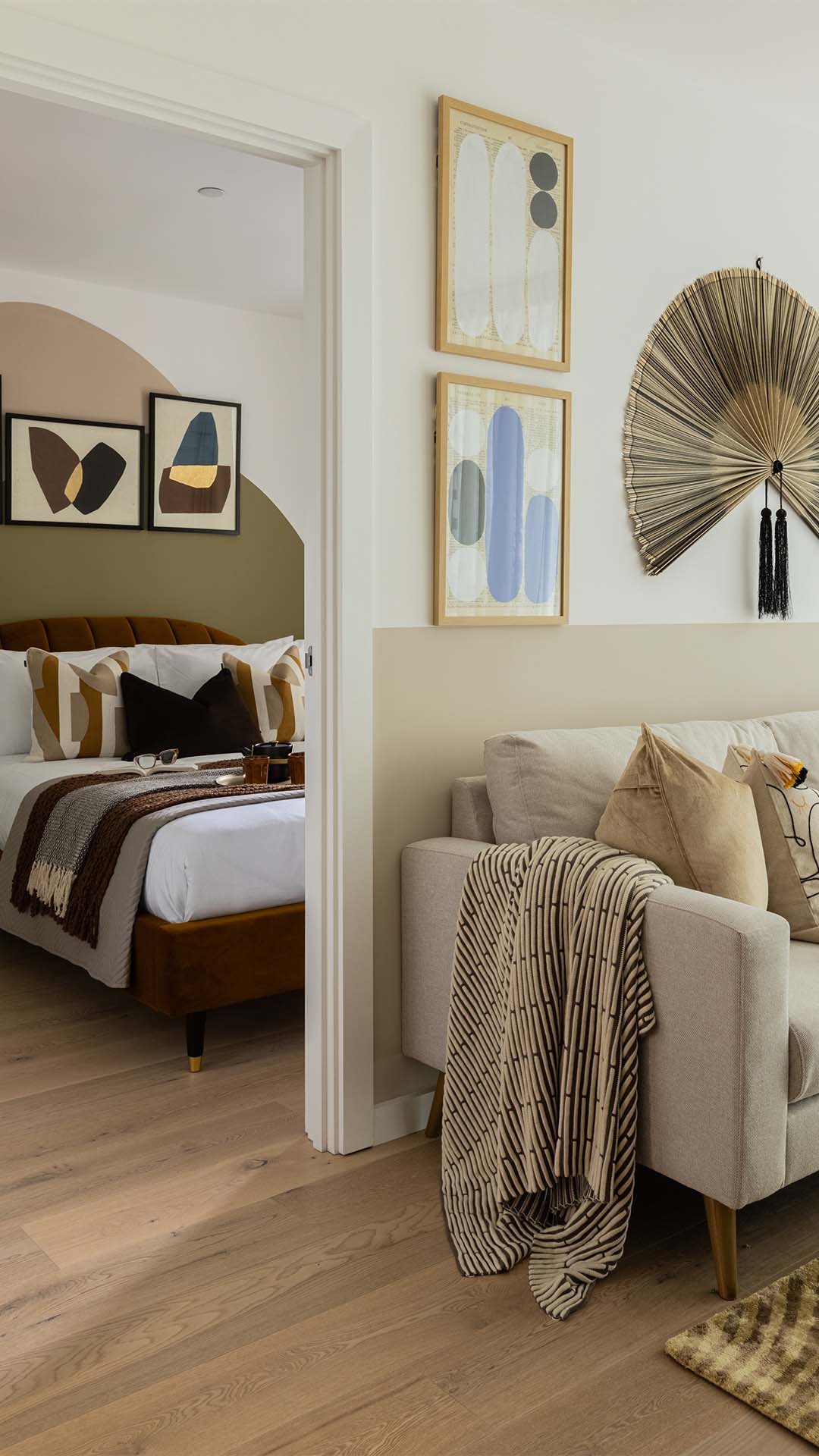 Open living space with sofa and bed
