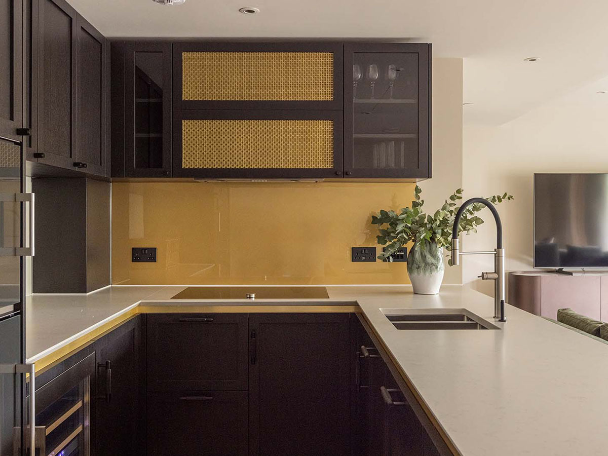 High-specification modern kitchen in a Heron Wharf apartment, ideal for a turnkey furnishing solution