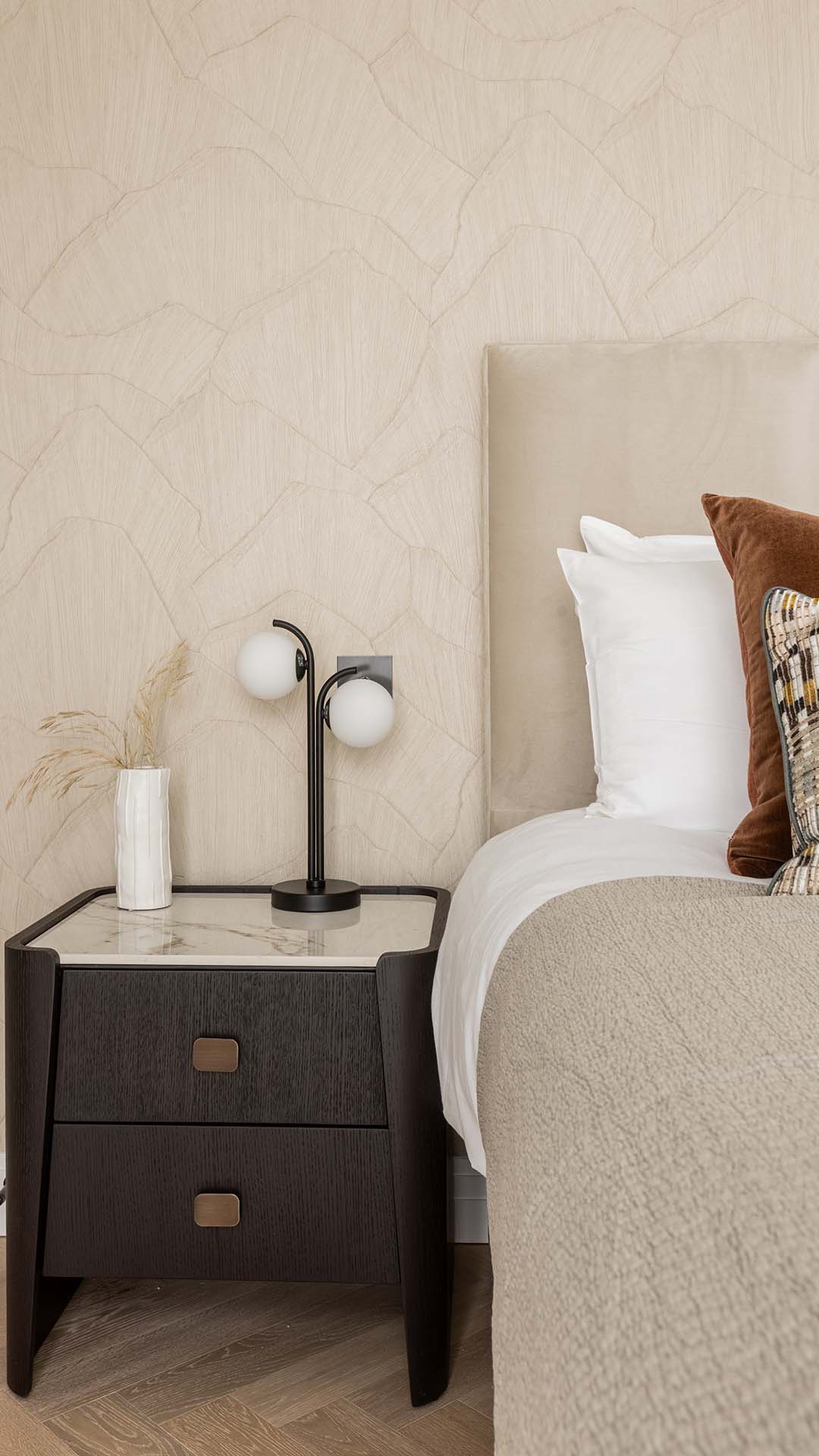 Detailed view of a bedroom side table with a modern lamp and decorative vase in a Kings Tower Chelsea London flat