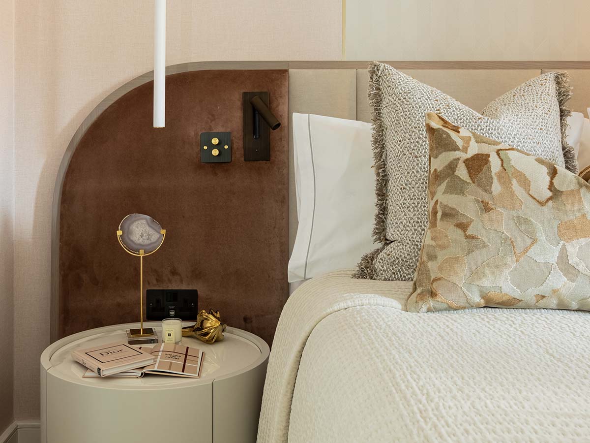 Detailed view of a luxurious bedside table and elegant decor, enhancing bedroom rental appeal in London