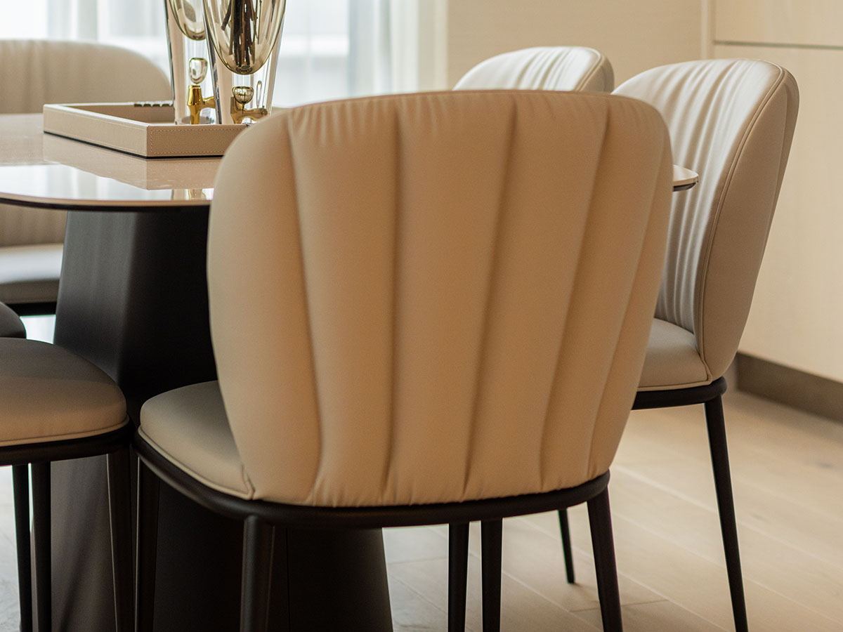 Close-up of elegant dining chairs, demonstrating quality furnishing for London investment properties