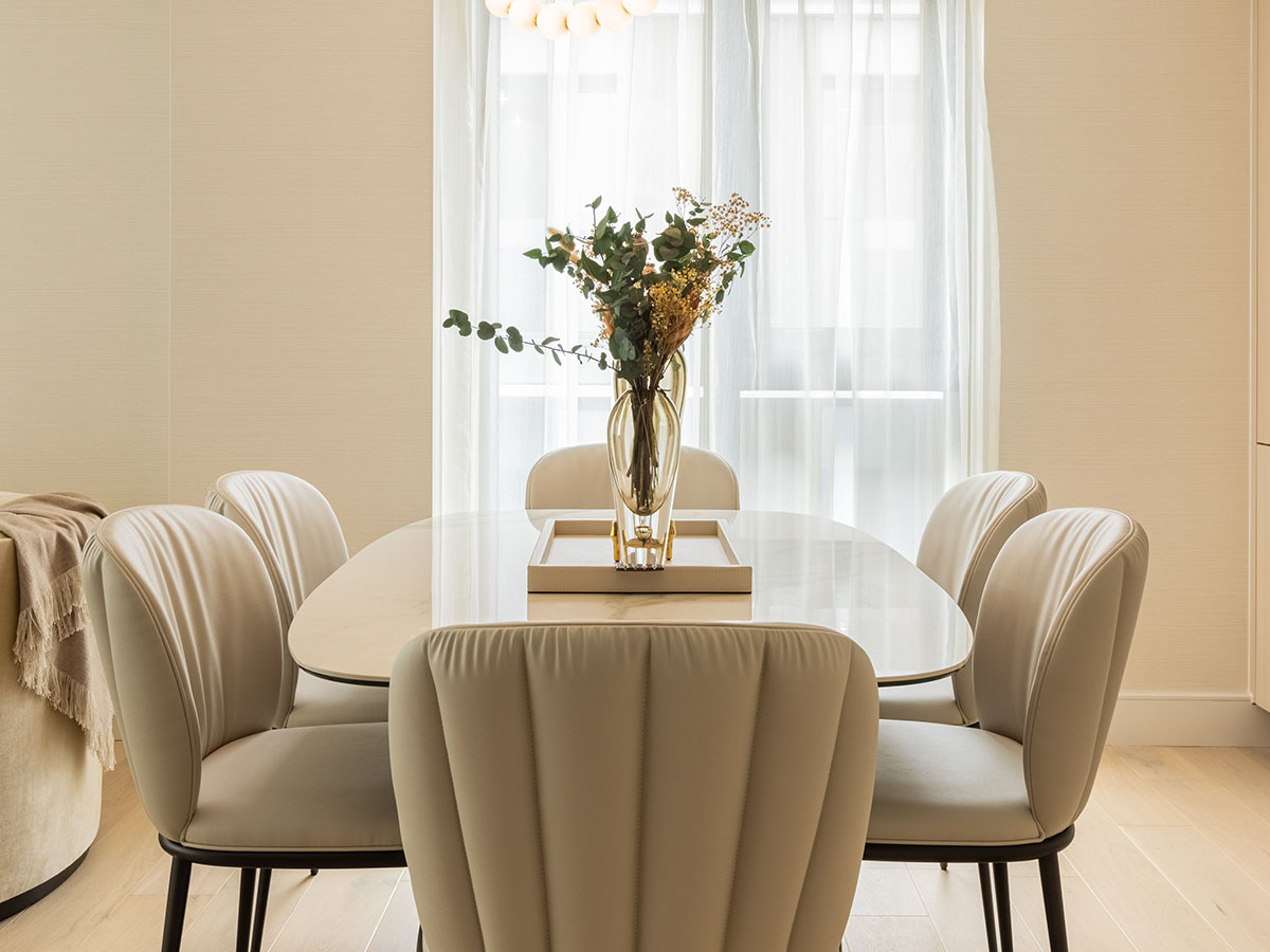 Elegantly staged dining table in a London flat, perfect for attracting high-quality tenants
