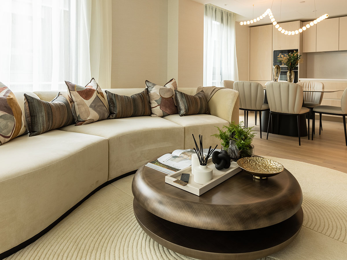 Open-plan living and dining area in a London flat, showcasing luxury furnishing for high rental appeal