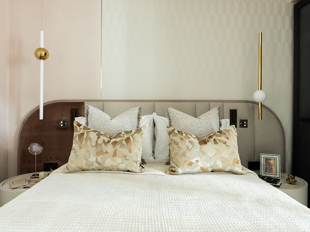 Master bedroom transformation with luxurious headboard and lighting, an InStyle Direct success story