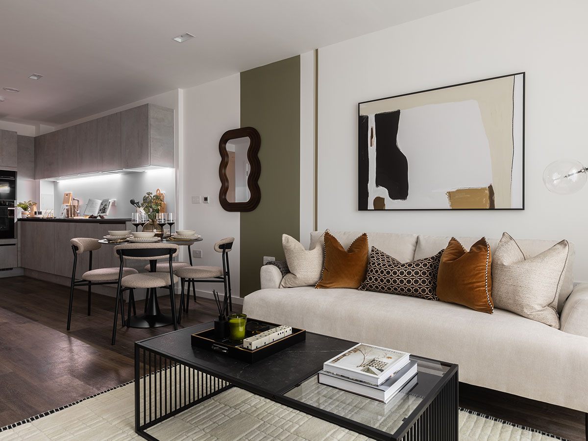 Open-plan living and dining area in a London flat, showcasing a professionally furnished space and modern kitchen