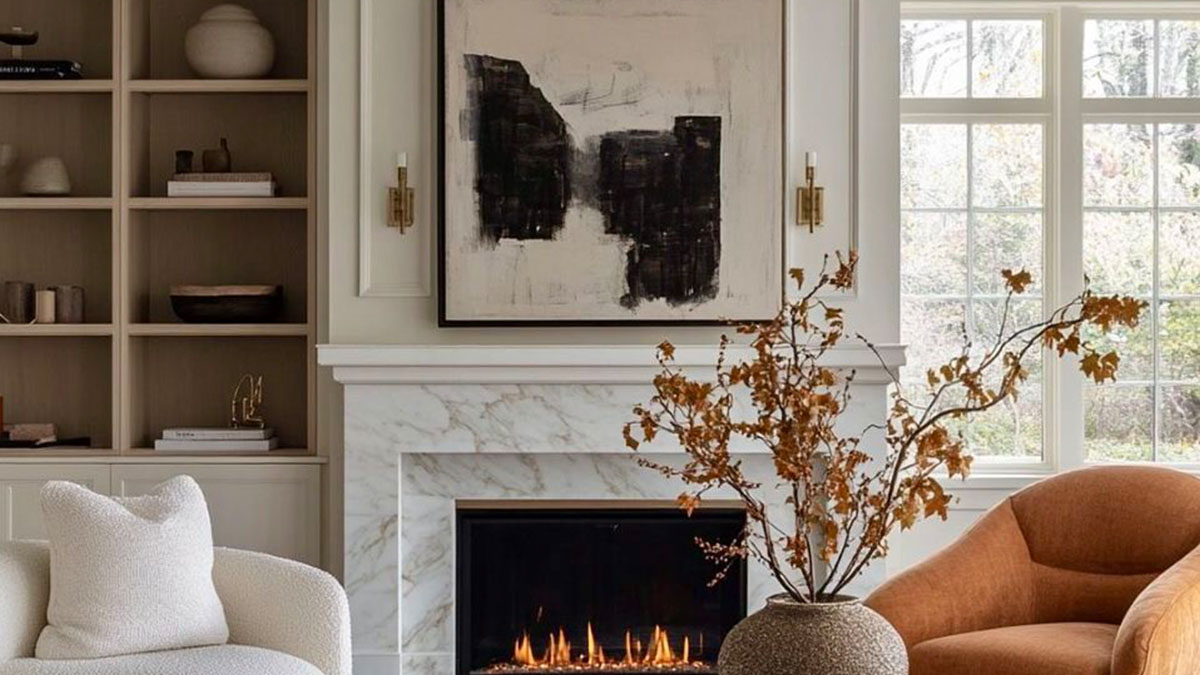 Elegant living room with a marble fireplace and abstract art
