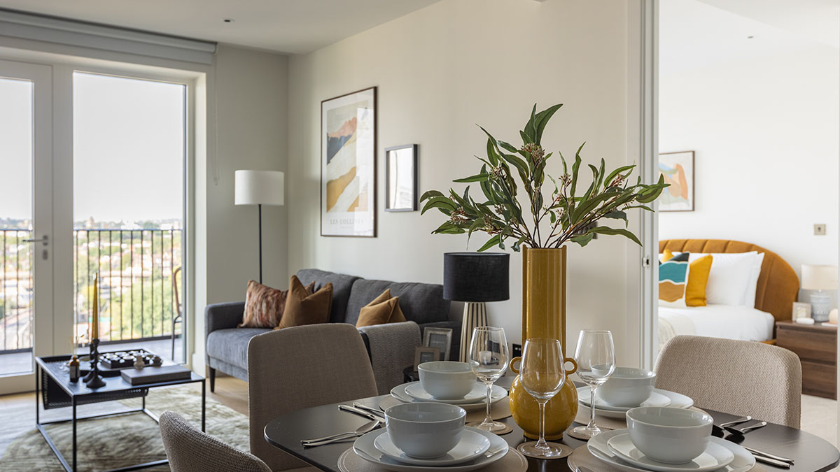 A view of a stylish London apartment's dining and living area, highlighting a seamless InStyle Direct interior design transformation