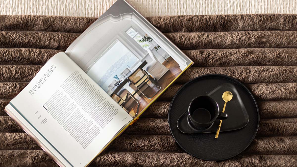A detail shot of luxury staging, showing how small touches increase the perceived value and appeal of a London flat
