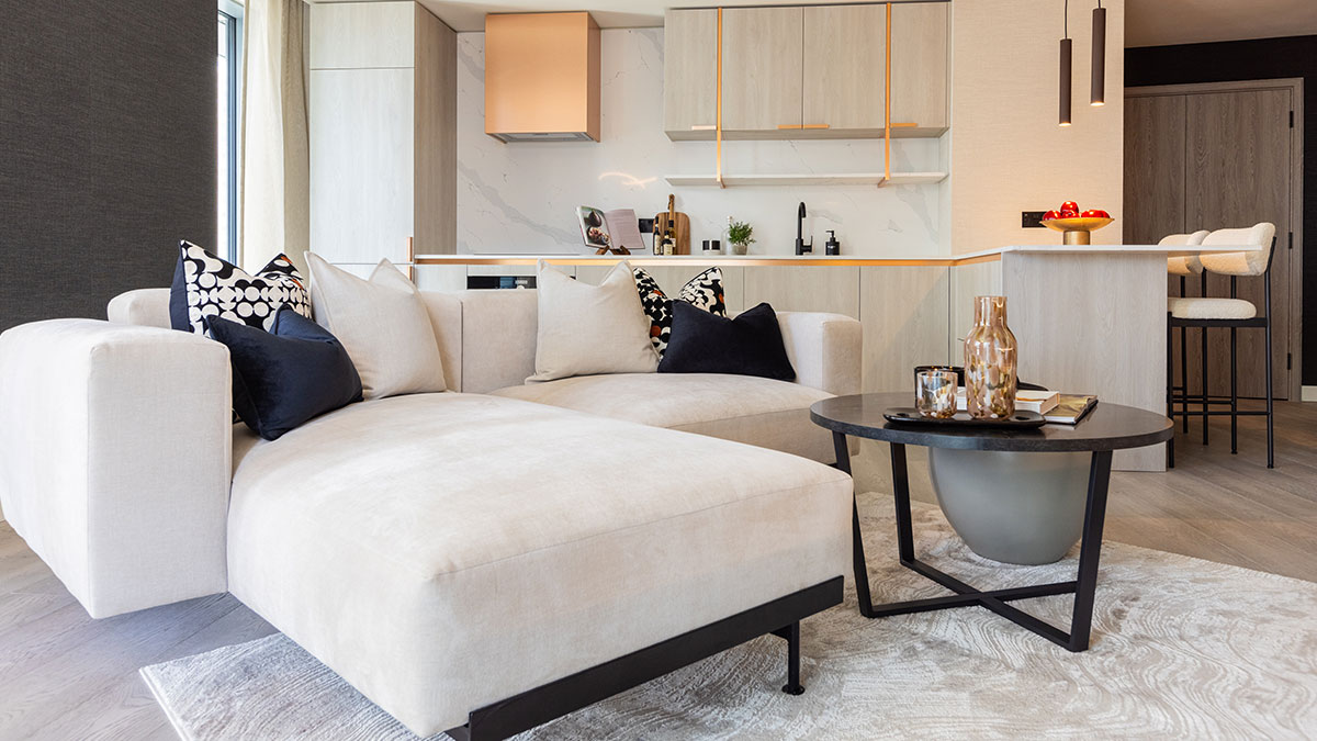 Open-plan living and kitchen area in a London flat, showcasing a comprehensive furnishing package