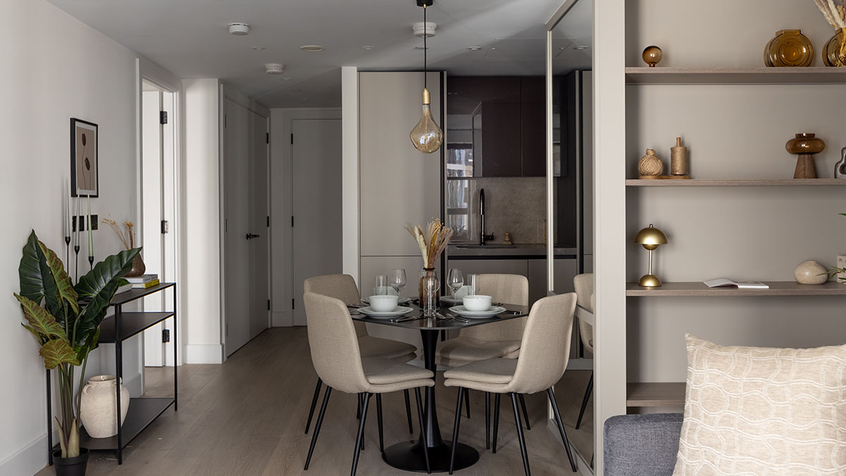 Living room furnishing in W2 London apartment with sofa styling and decor for property staging