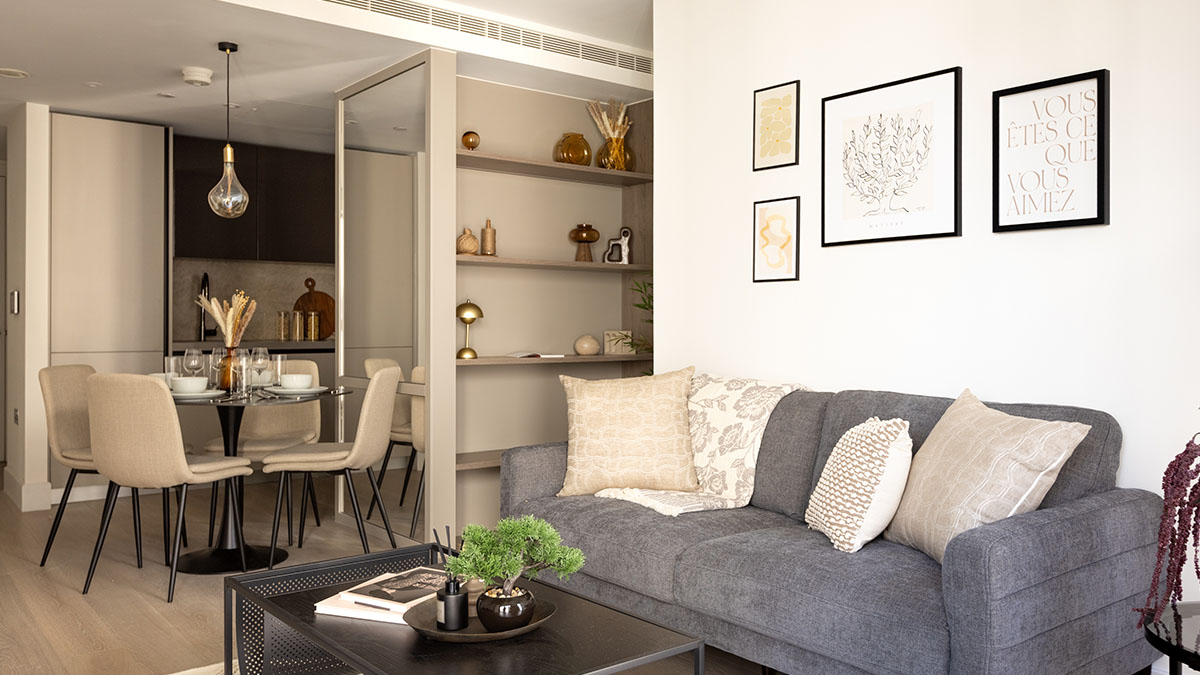 Property staging furniture layout in W2 London with sofa, shelving and decor styling