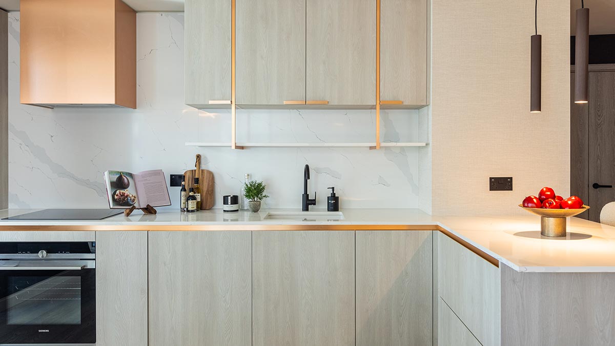 Sleek, modern kitchen design in a London rental flat, increasing its market attractiveness