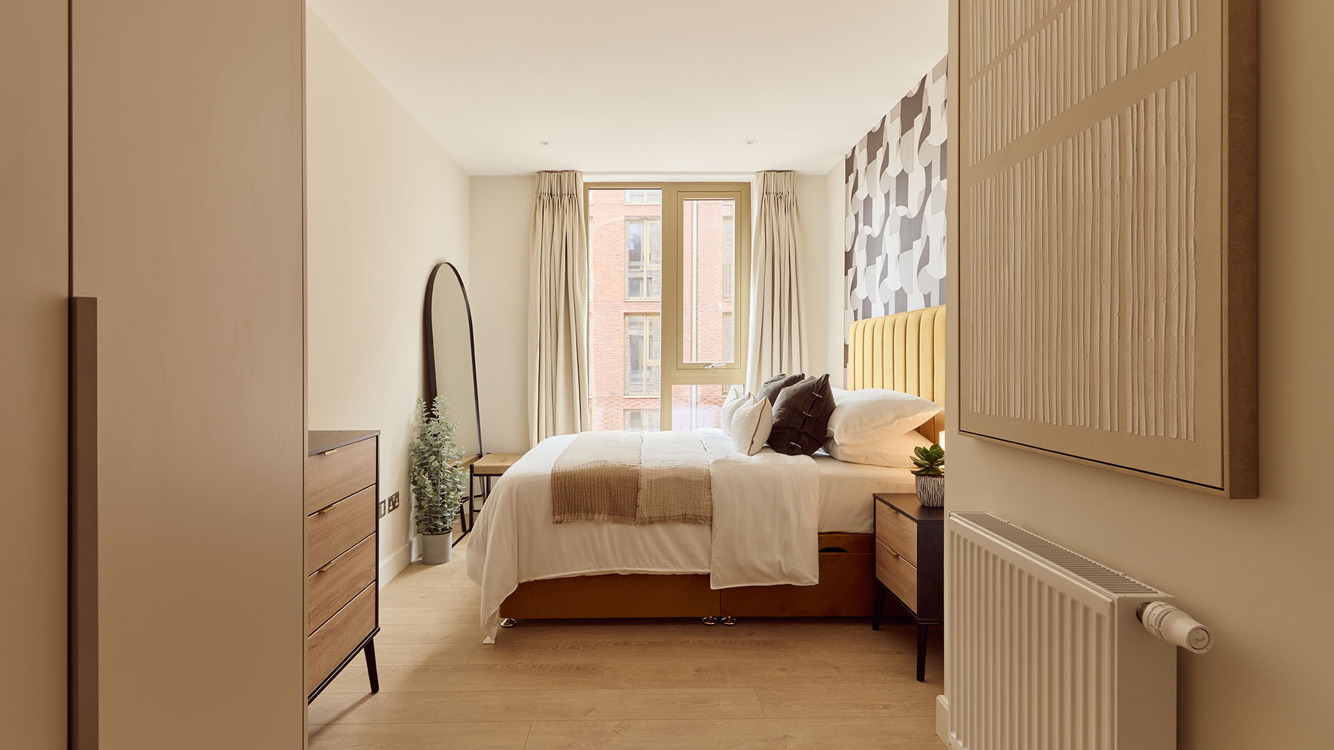 Stylish bedroom in London flat by InStyle Direct, demonstrating professional furnishing impact on rental appeal.