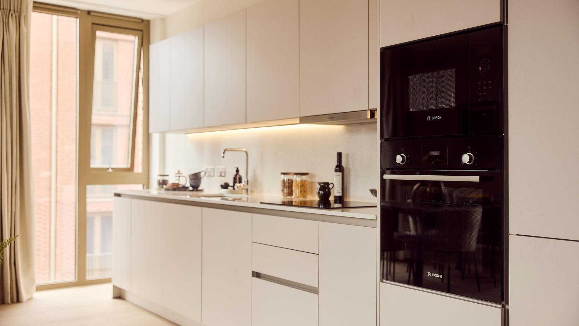 Elegant kitchen furnished by InStyle Direct showing high-end design for London rental investment