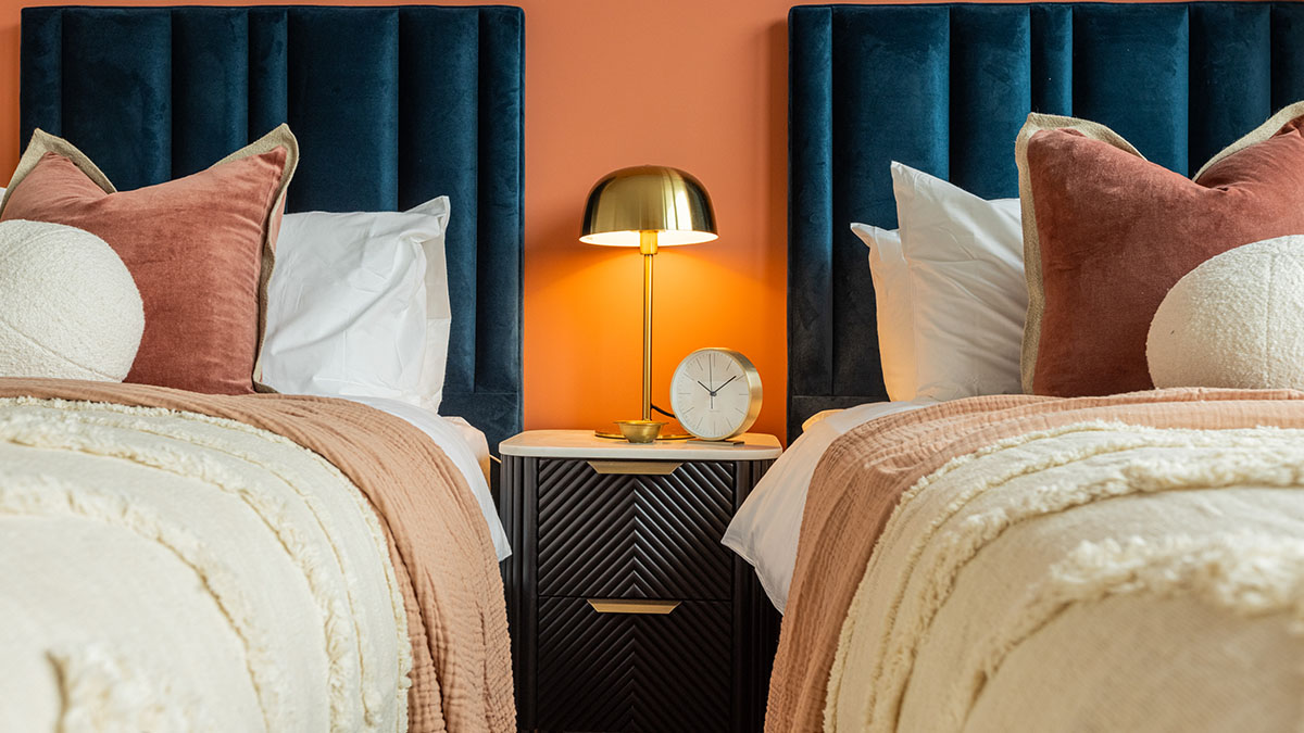 Professional twin room styling for a London Airbnb, showcasing furnishing packages for overseas investors.