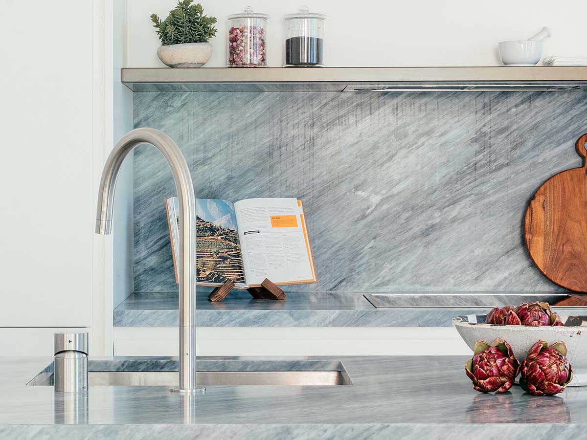 Open-plan living and dining area styled with contemporary furnishing packages for London investors.