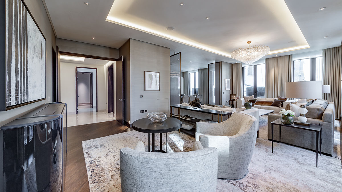 Luxury modern living room interior with neutral furnishings, chandelier lighting and contemporary décor