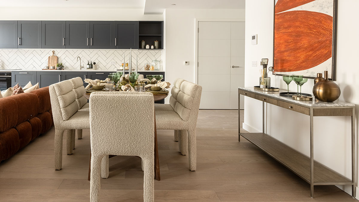 Fully furnished London property dining area with upholstered chairs, dining table and contemporary decorative styling.
